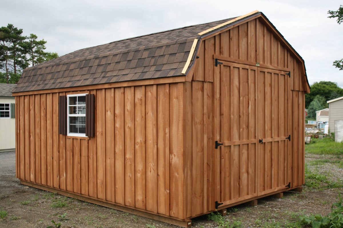 wooden shed with overhang