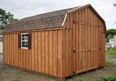 wooden shed with overhang